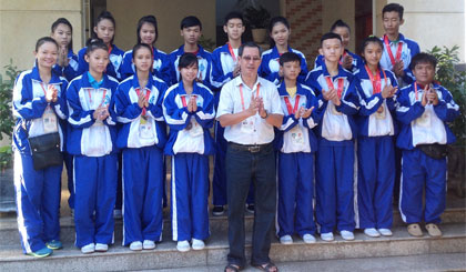 VĐV môn Taekwondo và huấn luyện viên.