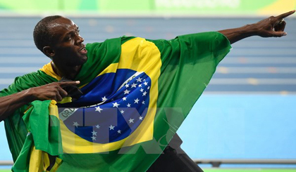 Usain Bolt hoàn tất “hat-trick” Huy chương vàng. (Nguồn: AFP/TTXVN)