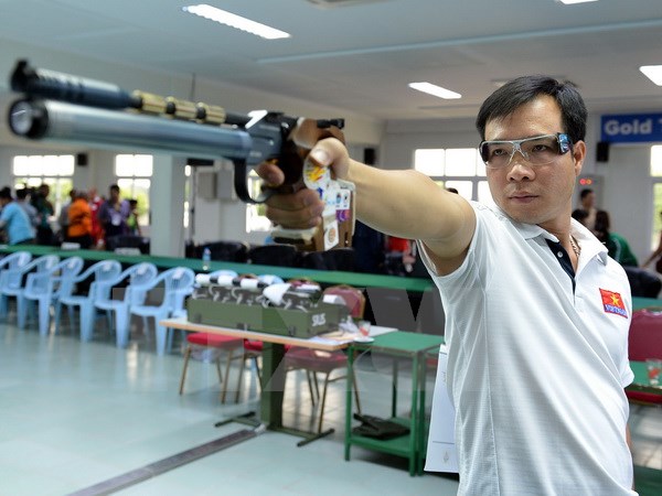 Xạ thủ Hoàng Xuân Vinh đoạt huy chương vàng cá nhân với thành tích 199.7 điểm tại SEA Games 27. (Ảnh: Thanh Hà/TTXVN)