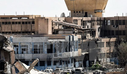 Cảnh đổ nát sau các cuộc không kích ở Syria. (Nguồn: AFP/TTXVN)
