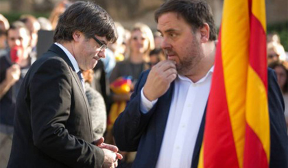 Cựu thủ hiến Catalonia Carles Puigdemont (trái). Ảnh: Getty Images