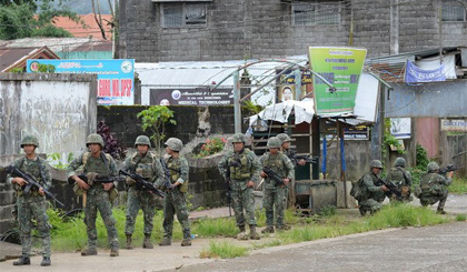 Binh sỹ tuần tra tại Marawi, Mindanao. Nguồn: AFP/TTXVN