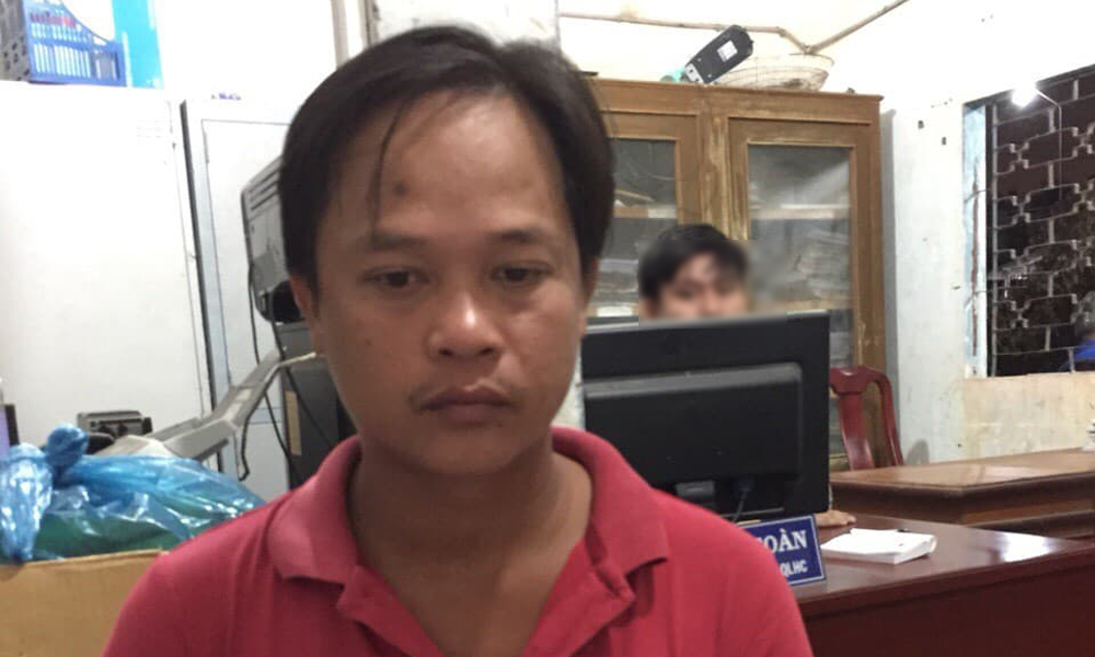 Đối tượng Trần Hoàng Giang tại cơ quan Công an. Ảnh: CA.