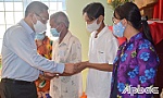 Trao thẻ bảo hiểm cho người dân huyện Cái Bè