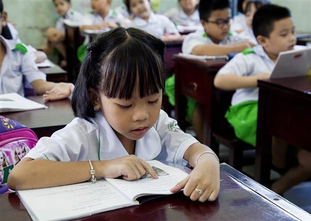 Học sinh lớp 1 trong giờ học môn Tiếng Việt, Chương trình giáo dục phổ thông mới. (Ảnh: TTXVN)