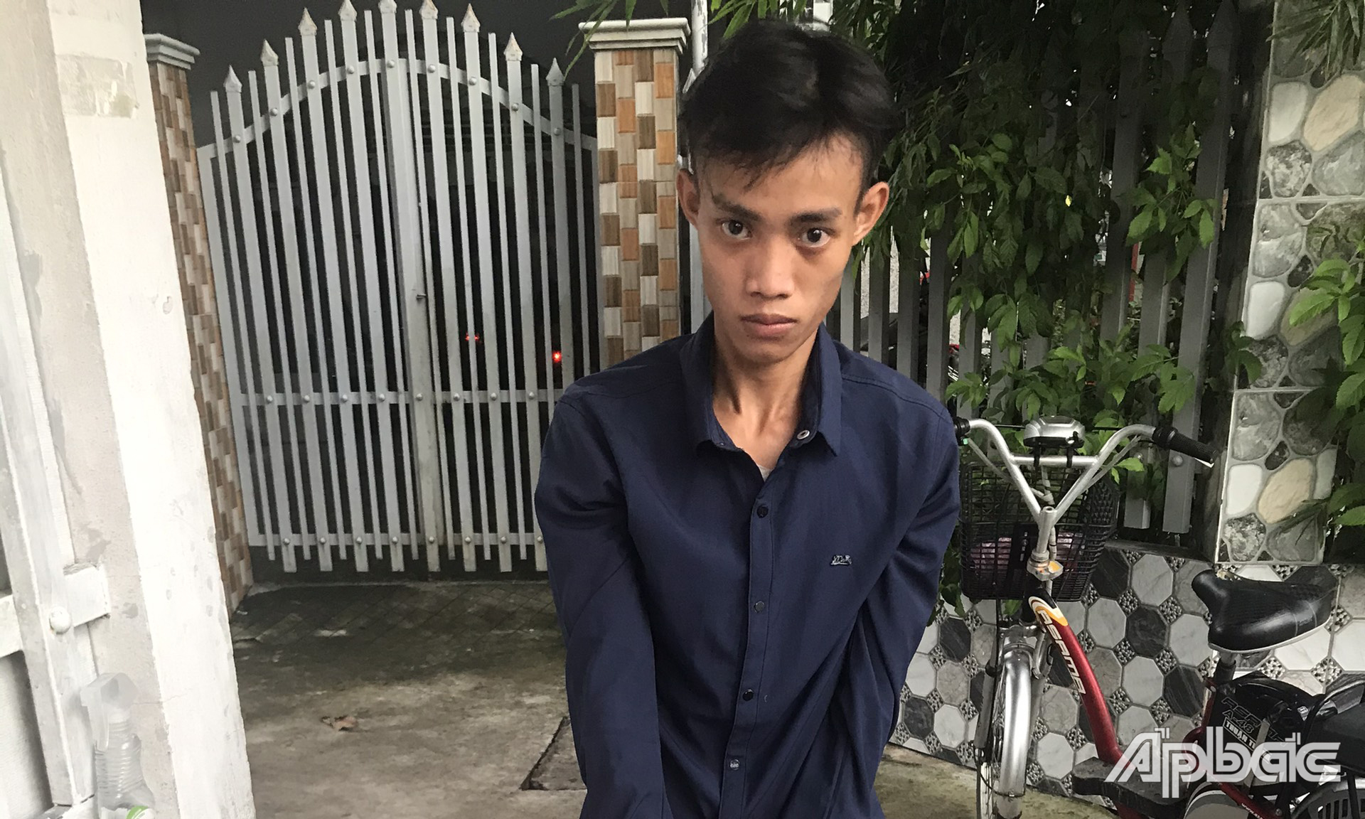 Thái bị Công an bắt giữ.