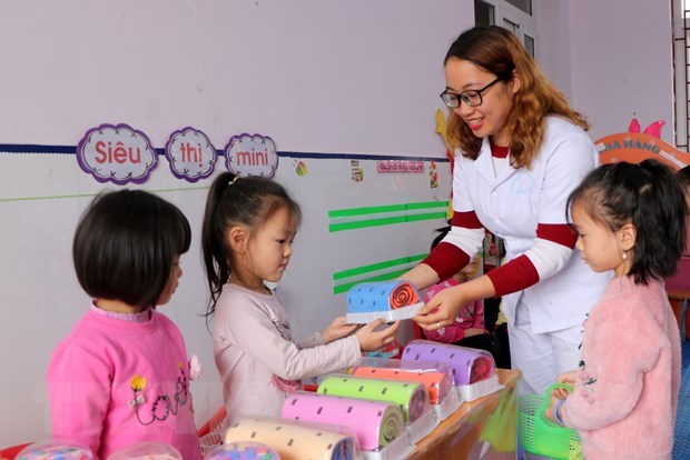 Học sinh mầm non 5 tuổi sẽ được miễn học phí từ năm học 2024-2025. (Ảnh: TTXVN)