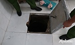 Bắt đối tượng truy nã lẩn trốn dưới hầm