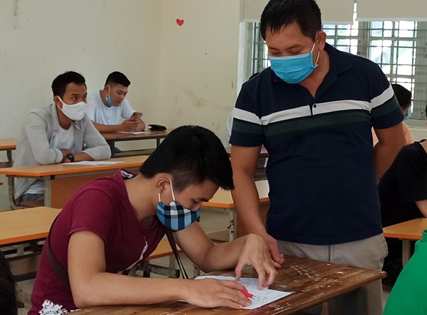 Thí sinh dự tốt nghiệp trung học phổ thông. (Ảnh: Phạm Mai/Vietnam+)