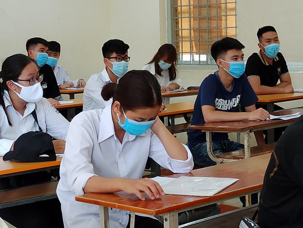Thí sinh dự thi tốt nghiệp Trung học phổ thông. (Ảnh: Phạm Mai/Vietnam+)