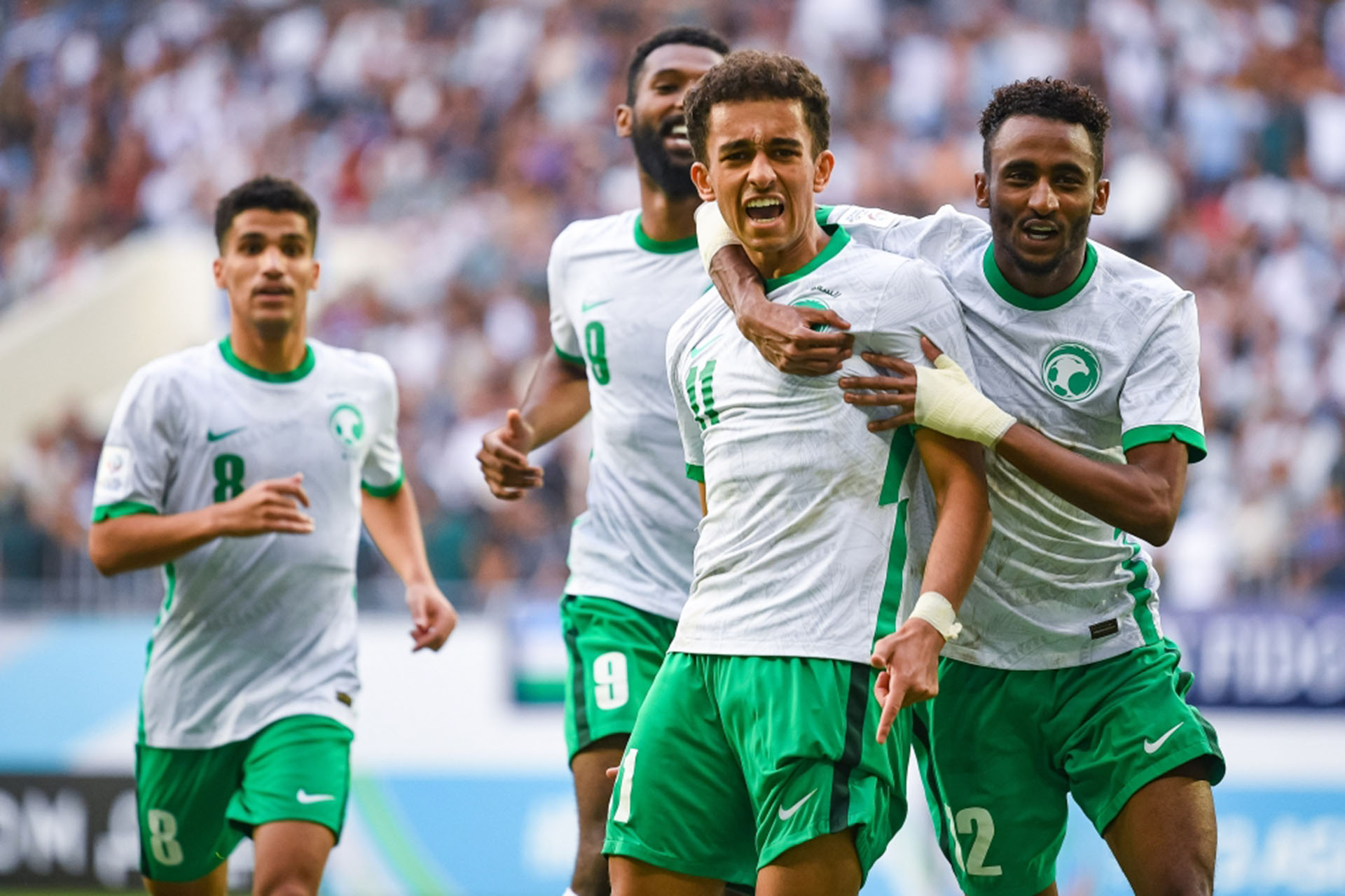 Các cầu thủ Saudi Arabia ăn mừng bàn mở tỷ số phút 48 của Ahmed. (Ảnh: AFC)