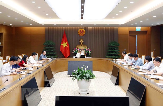 Phó Thủ tướng Vũ Đức Đam họp với Bộ Giáo dục và Đào tạo về sách giáo khoa. (Ảnh: Phạm Kiên/TTXVN)