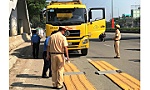 Không có chuyện hết cao điểm sẽ dừng xử lý xe quá tải