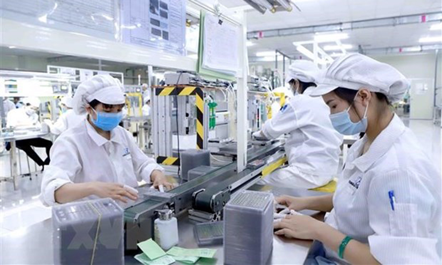 Nhiều nhà đầu tư vẫn lựa chọn Việt Nam là điểm đến và mở rộng kế hoạch đầu tư kinh doanh. Ảnh: TTXVN