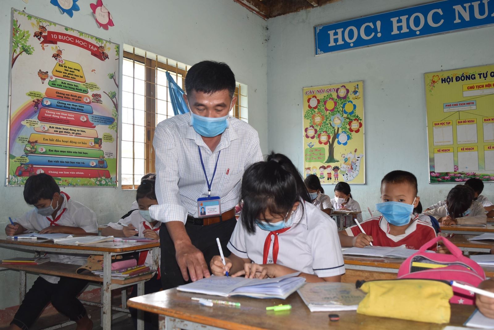 Lộ trình miễn giảm học phí được một số tỉnh, thành dự kiến trong năm học 2022 - 2023. Ảnh: TTXVN