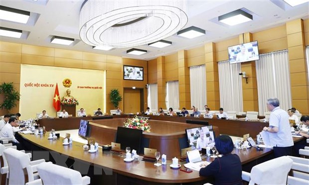 UBTV Quốc hội thông qua dự án Pháp lệnh Xử phạt vi phạm hành chính đối với hành vi cản trở hoạt động tố tụng ngày 18/8. (Ảnh: Doãn Tuấn/TTXVN)