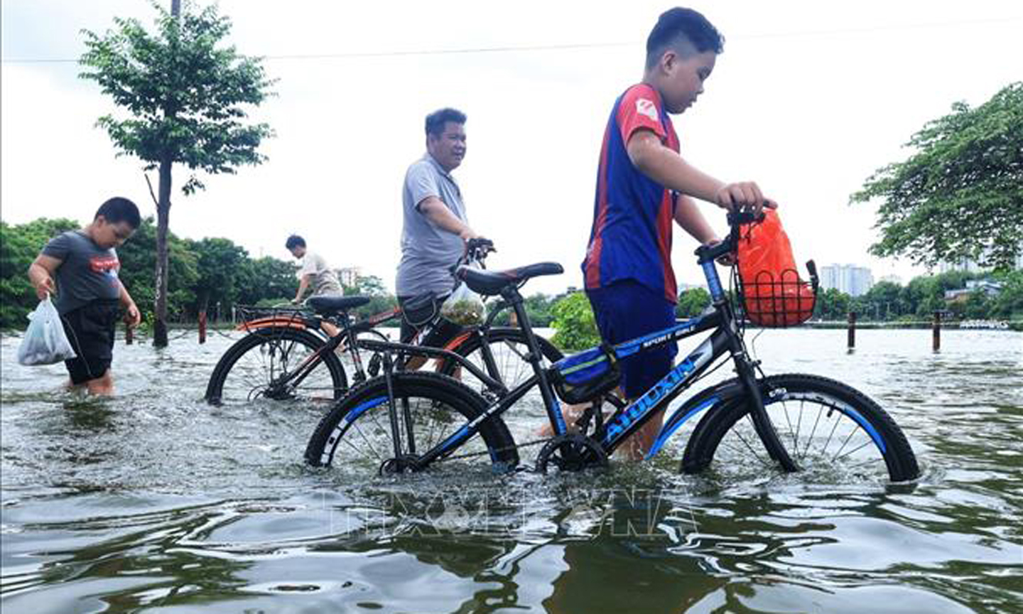 Thủ đô Hà Nội chiều tối và đêm có mưa rào, dông vài nơi. Ảnh: Tuấn Anh/TTXVN