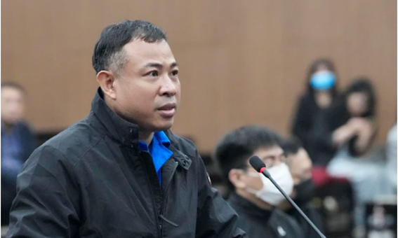 Bị cáo Nghiêm Quang Minh. Ảnh: ĐỖ TRUNG