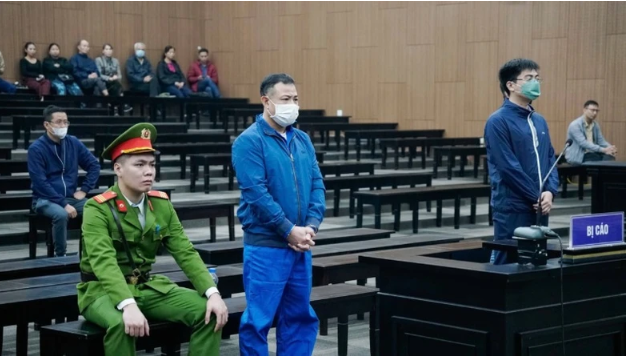 Bị cáo Nghiêm Quang Minh bị tuyên án 12 năm tù.