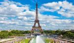Tại sao tháp Eiffel cao lên vào mỗi mùa hè?